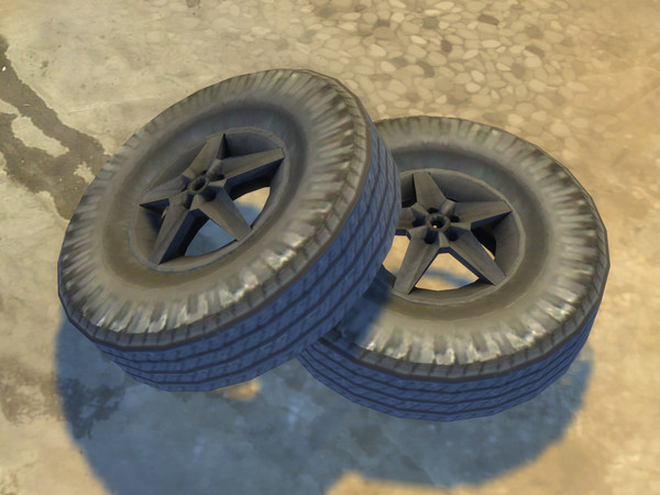 Sims 4 — Two piled wheels by Cyclonesue — More aesthetically pleasing than just one. More decorative garbage for your