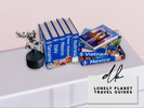 Sims 4 — Lonely Planet Travel Guides by dksimsxo — Includes 2 variations of the stacked books. For the upright individual